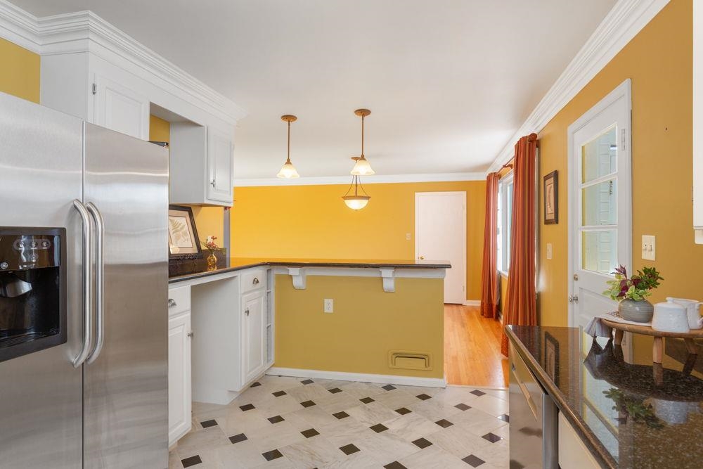 210 Edgewood Road Staunton, VA 24401 - Photo 17 of 41 a bathroom with a granite countertop sink a large mirror and a shower