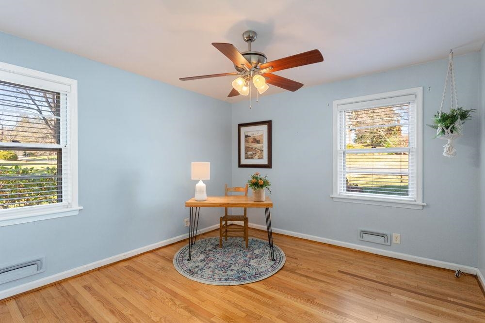 210 Edgewood Road Staunton, VA 24401 - Photo 26 of 41 a workspace with wooden floor and a window