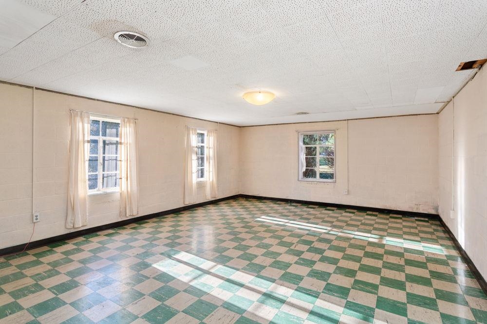 210 Edgewood Road Staunton, VA 24401 - Photo 33 of 41 a view of an empty room with window and stairs