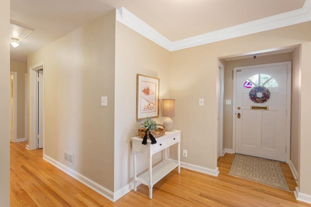 210 Edgewood Road Staunton, VA 24401 - Photo 4 of 41 a view of a hallway with bathroom and wooden floor