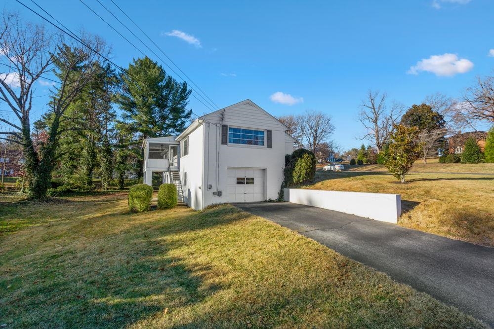 210 Edgewood Road Staunton, VA 24401 - Photo 41 of 41 a view of a house with a big yard and large trees