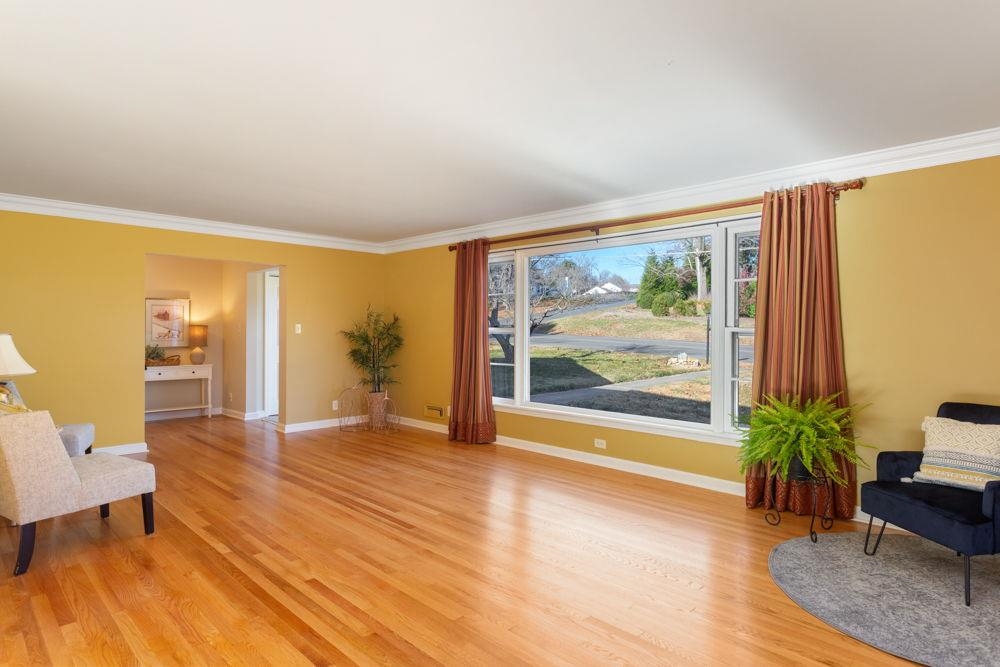 210 Edgewood Road Staunton, VA 24401 - Photo 6 of 41 a view of a room with furniture and a large window