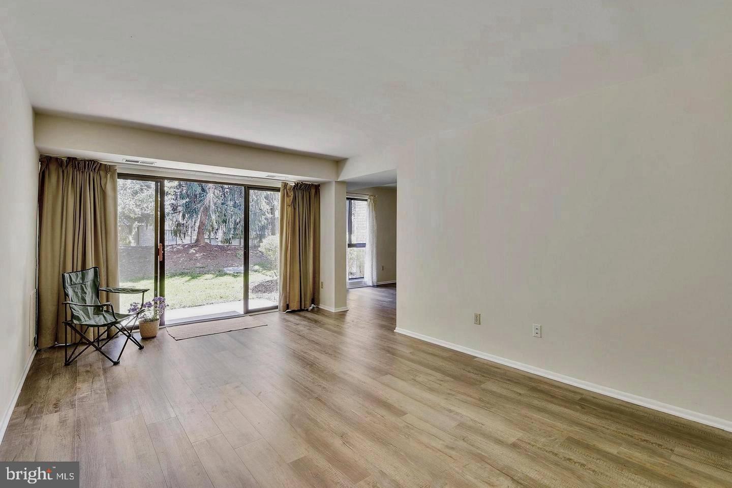 2044 Royal Fern Court, Unit 19/2A Reston, VA 20191 - Photo 5 of 17 Huge Living Room open to patio
