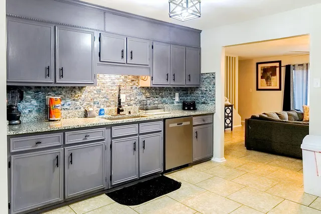 a bathroom with a toilet and a mirror