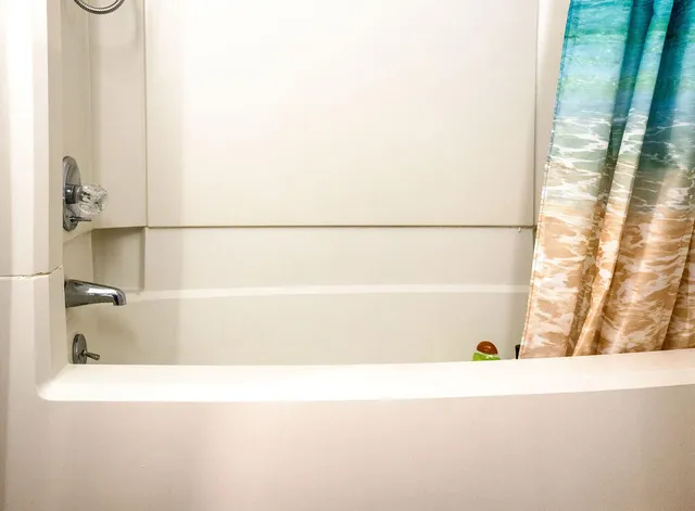 a view of a bathroom with a shower