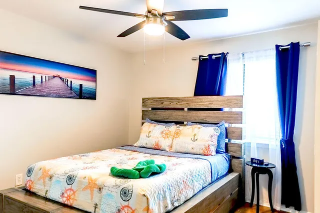 a dining room with a table and chairs
