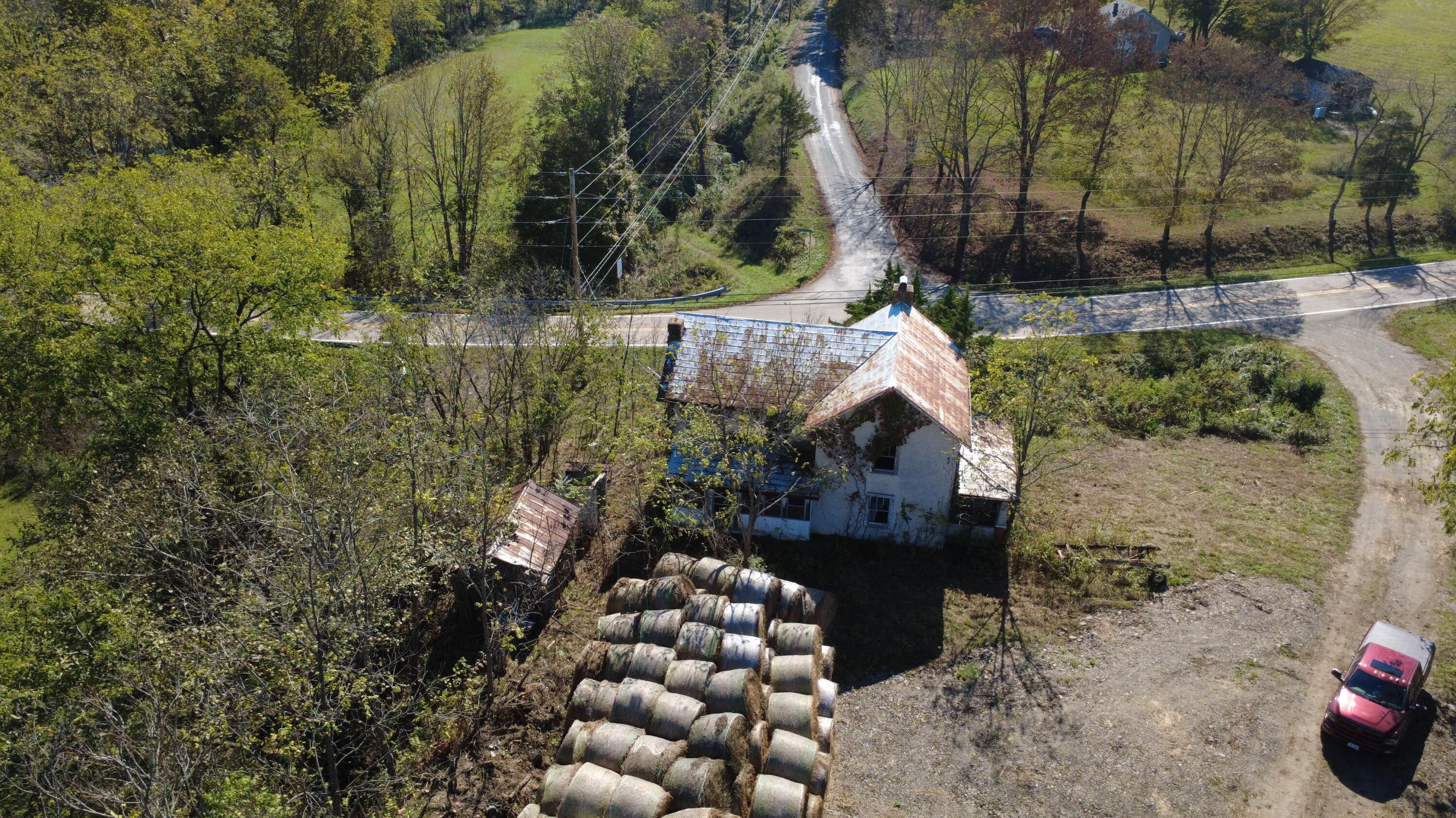 6402 Potts Creek Road Covington, VA 24426 - Photo 12 of 34 a view of a wooden house with a yard
