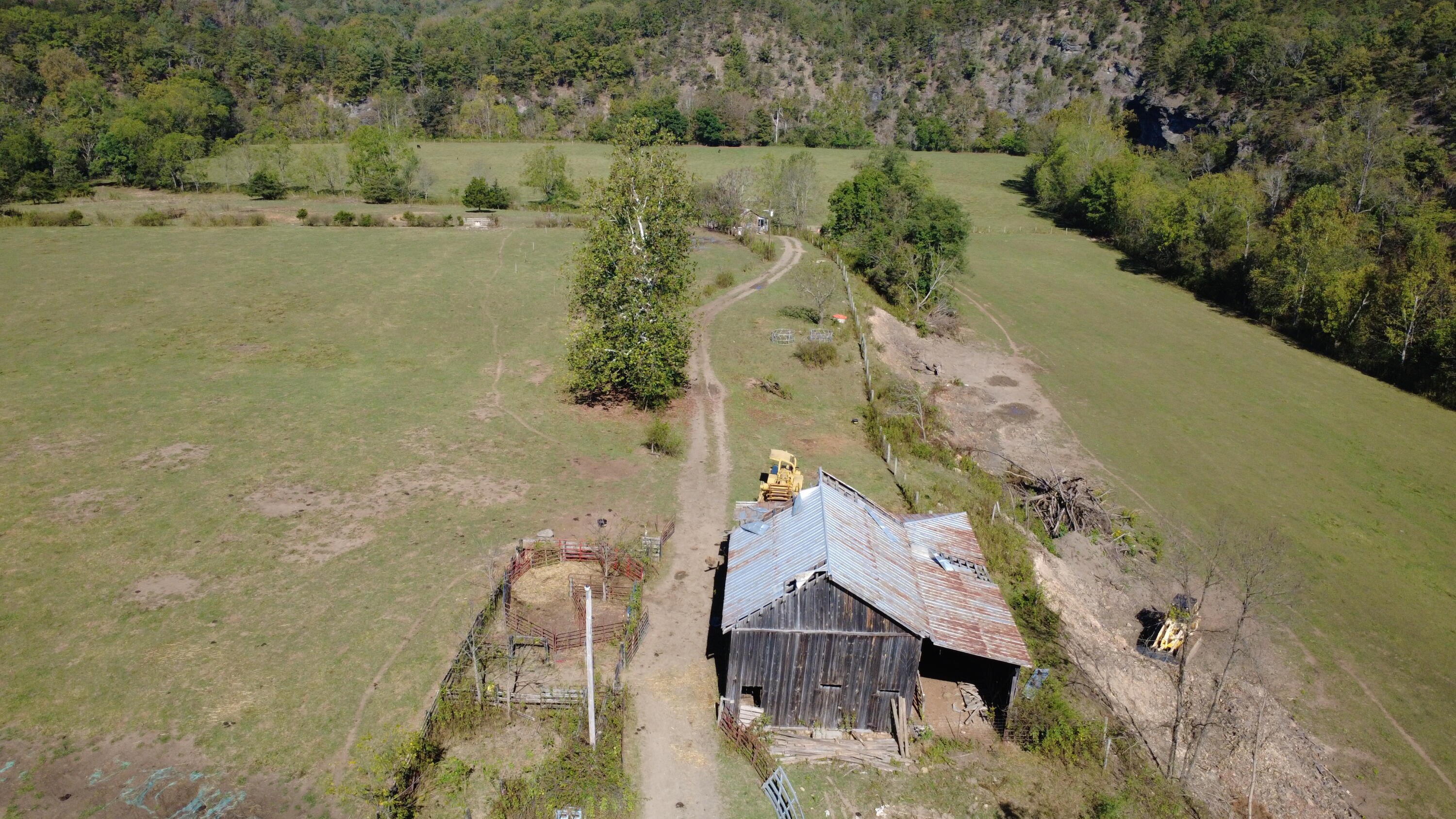 6402 Potts Creek Road Covington, VA 24426 - Photo 26 of 34 an aerial view of a house with a yard and lake view