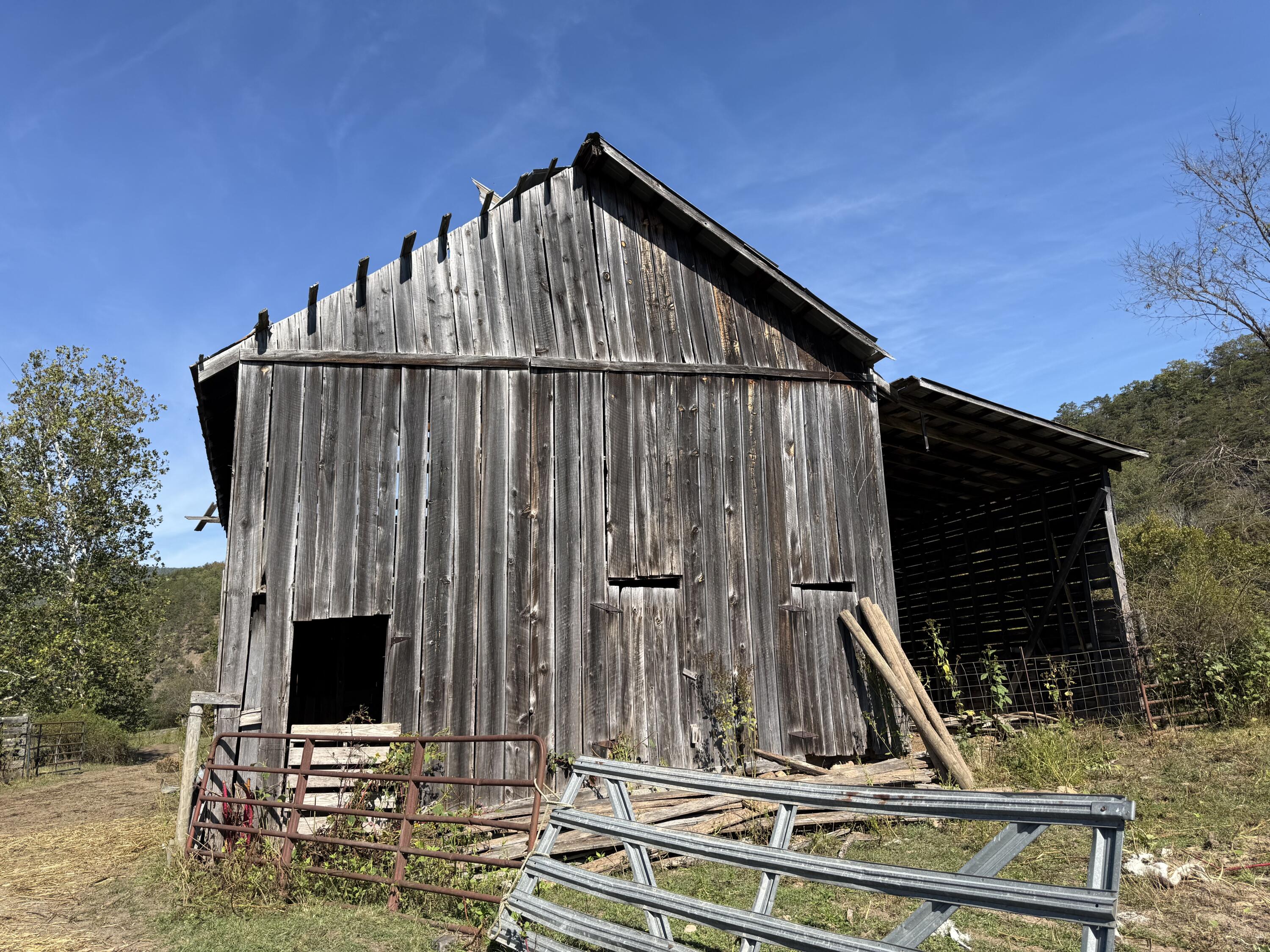 6402 Potts Creek Road Covington, VA 24426 - Photo 28 of 34 a view of a house with large trees