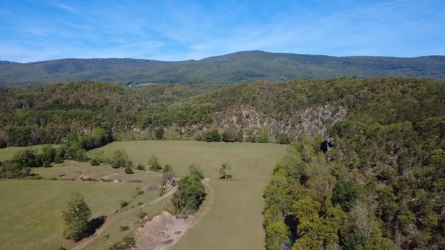 a view of lake with mountain