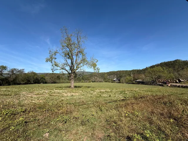 a view of mountain with lake view