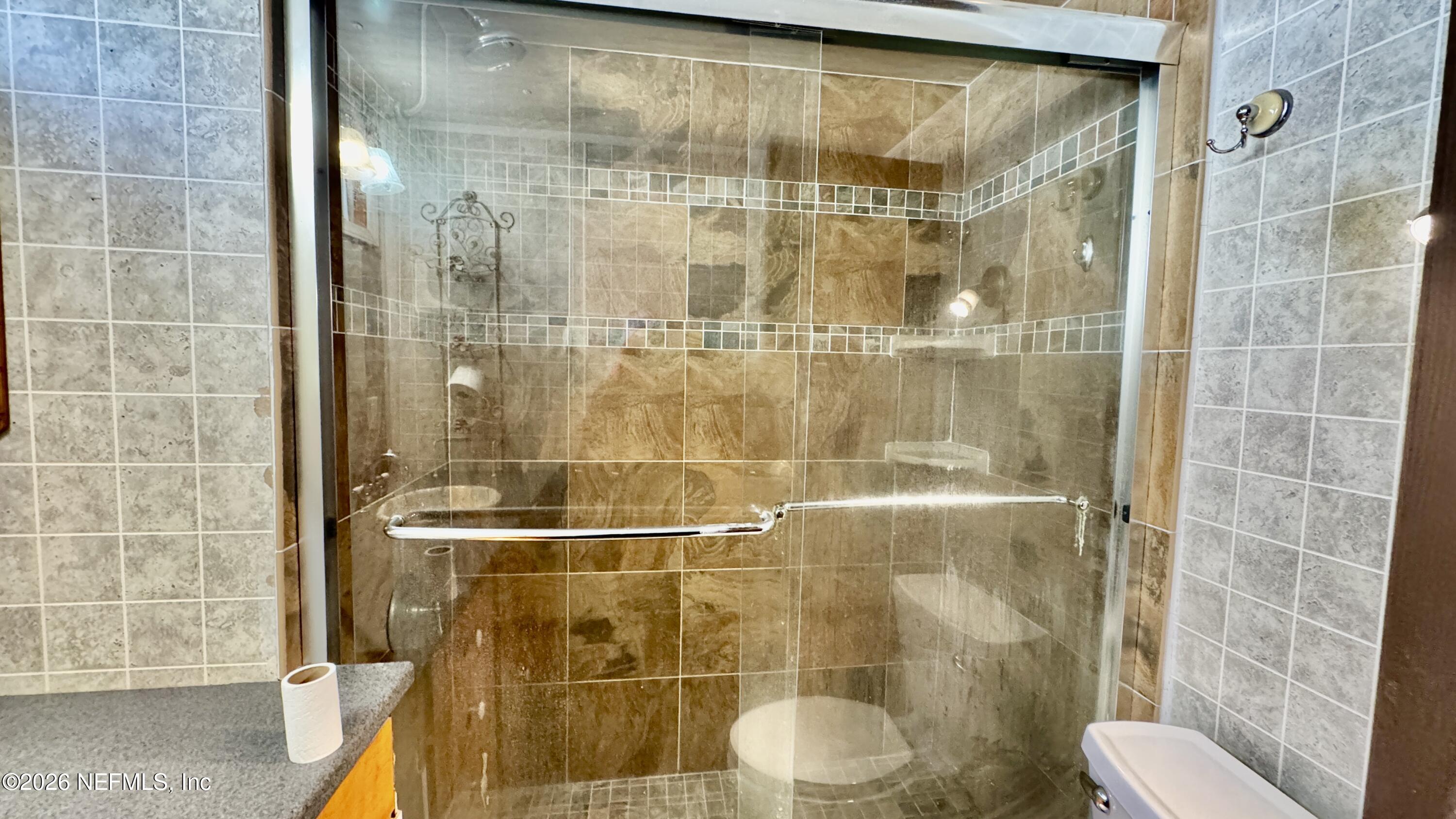 105 Rachel Road Interlachen, FL 32148 - Photo 17 of 24 a bathroom with a shower