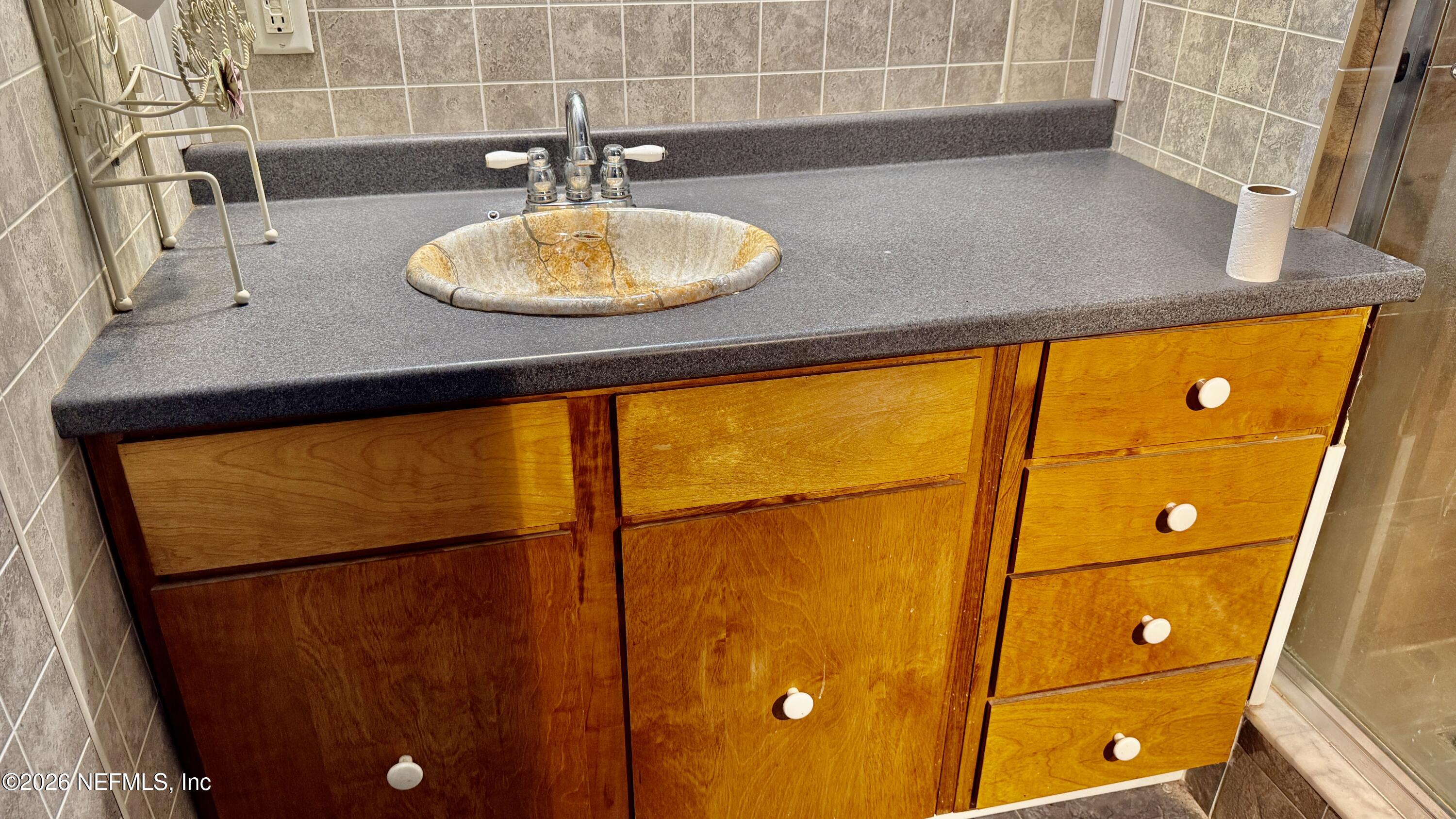 105 Rachel Road Interlachen, FL 32148 - Photo 19 of 24 a bathroom with a sink