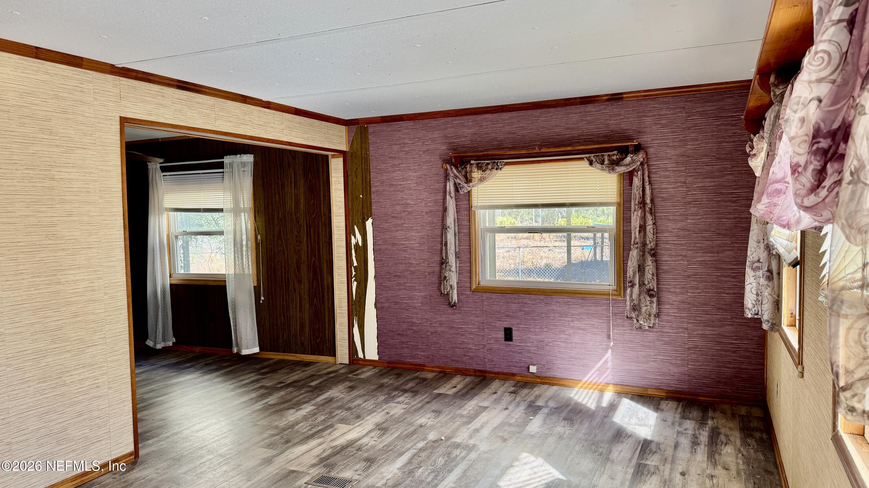 105 Rachel Road Interlachen, FL 32148 - Photo 10 of 24 a view of an empty room with a window