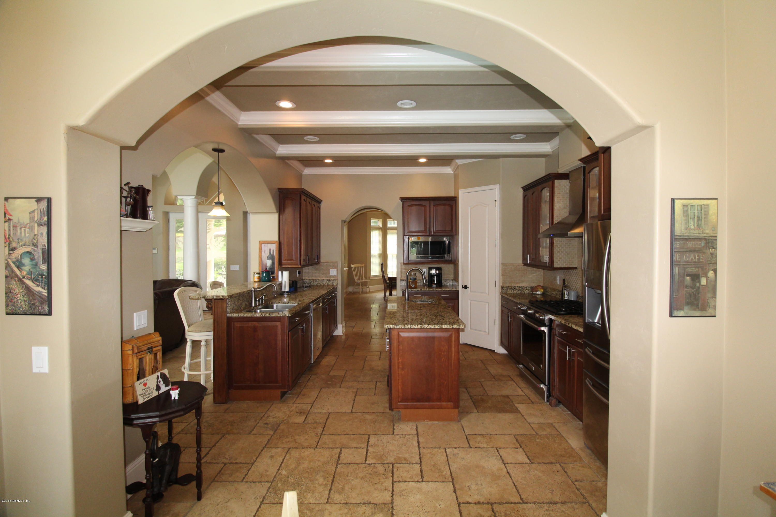 6471 Immokalee Road Keystone Heights, FL 32656 - Photo 23 of 103 a lobby with furniture and a dining table
