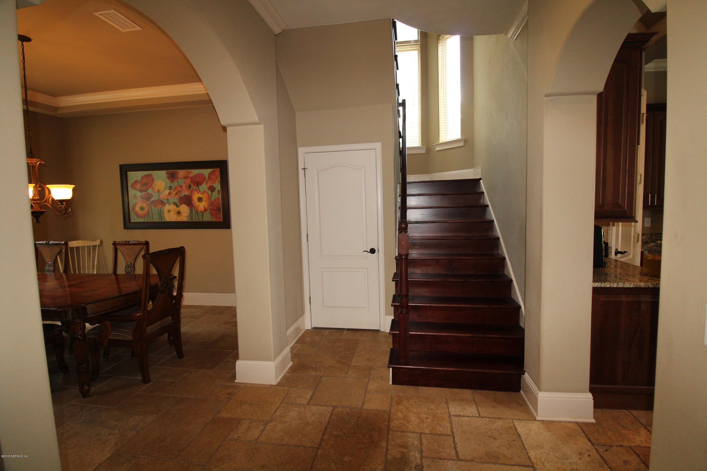 6471 Immokalee Road Keystone Heights, FL 32656 - Photo 31 of 103 a view of entryway and hall with wooden floor