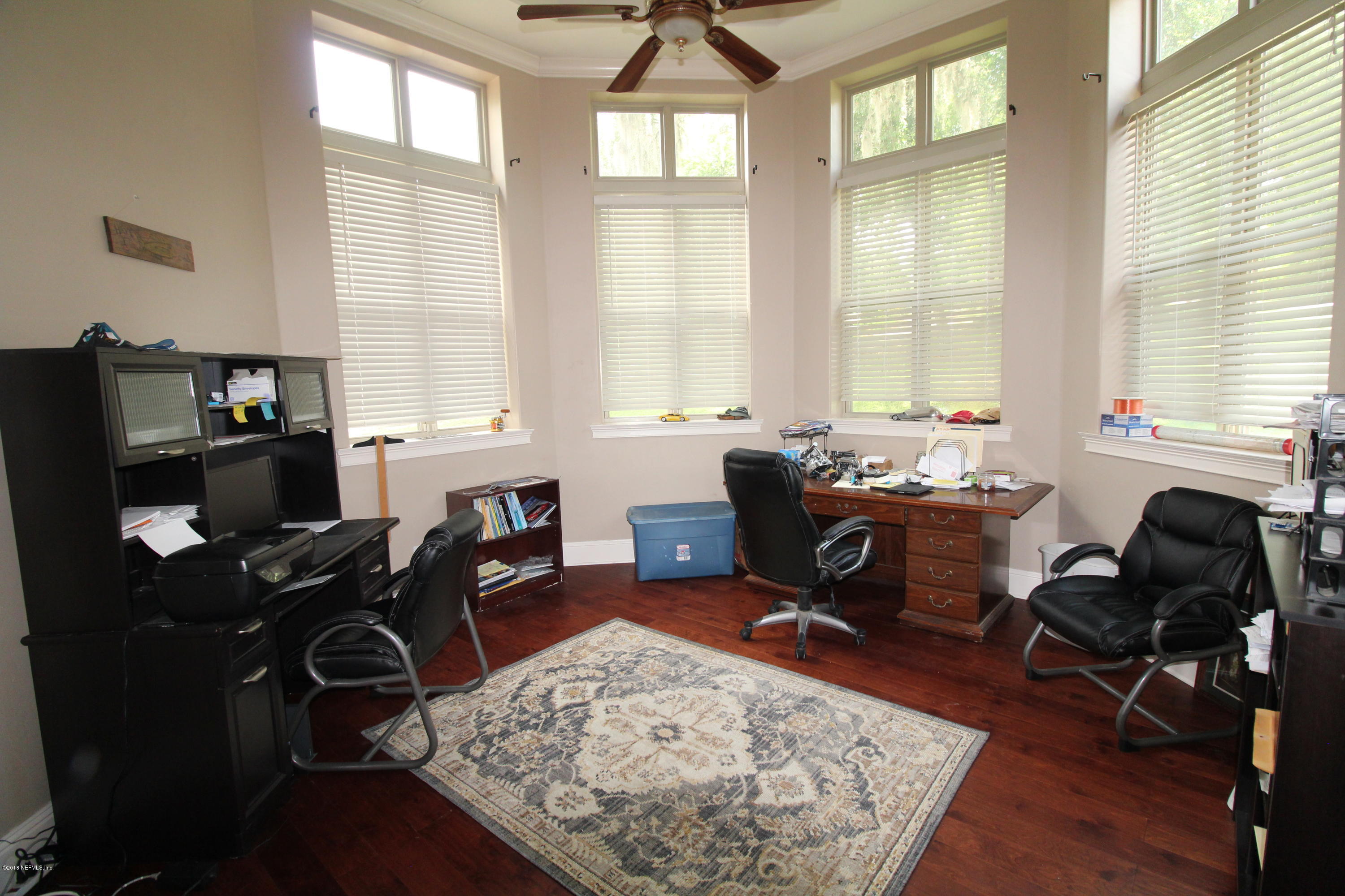 6471 Immokalee Road Keystone Heights, FL 32656 - Photo 36 of 103 a view of a workspace with furniture and a window