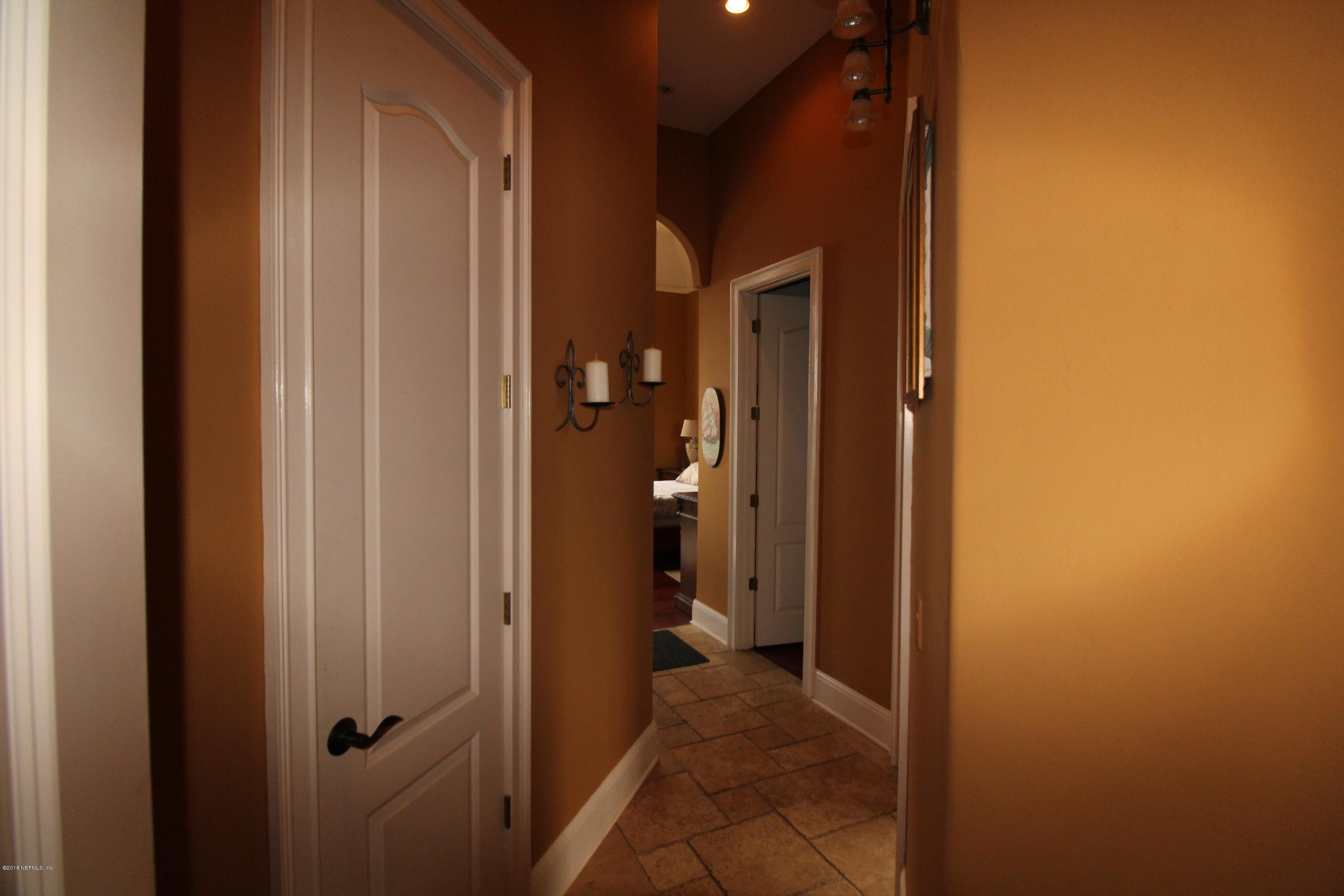 6471 Immokalee Road Keystone Heights, FL 32656 - Photo 39 of 103 a view of a bathroom from a hallway