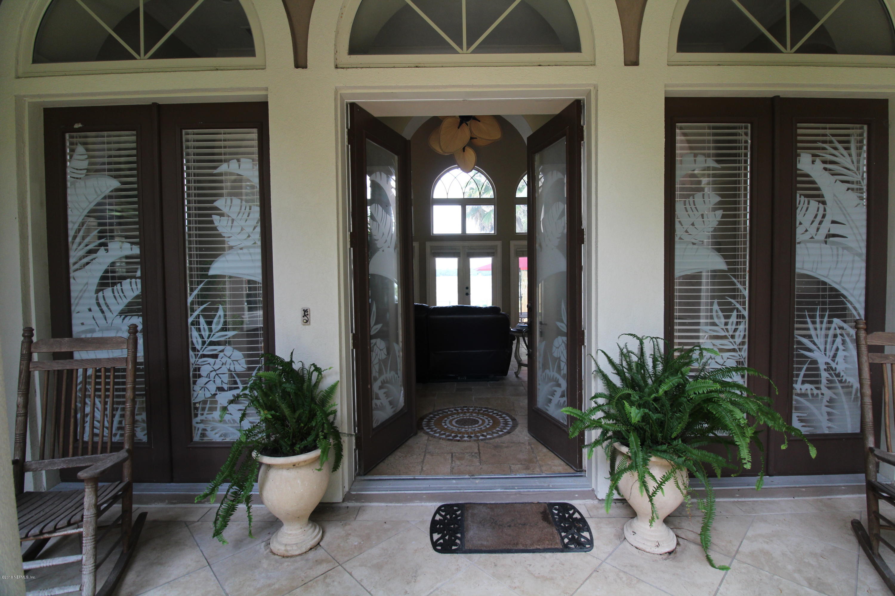 6471 Immokalee Road Keystone Heights, FL 32656 - Photo 4 of 103 a view of a house with potted plants