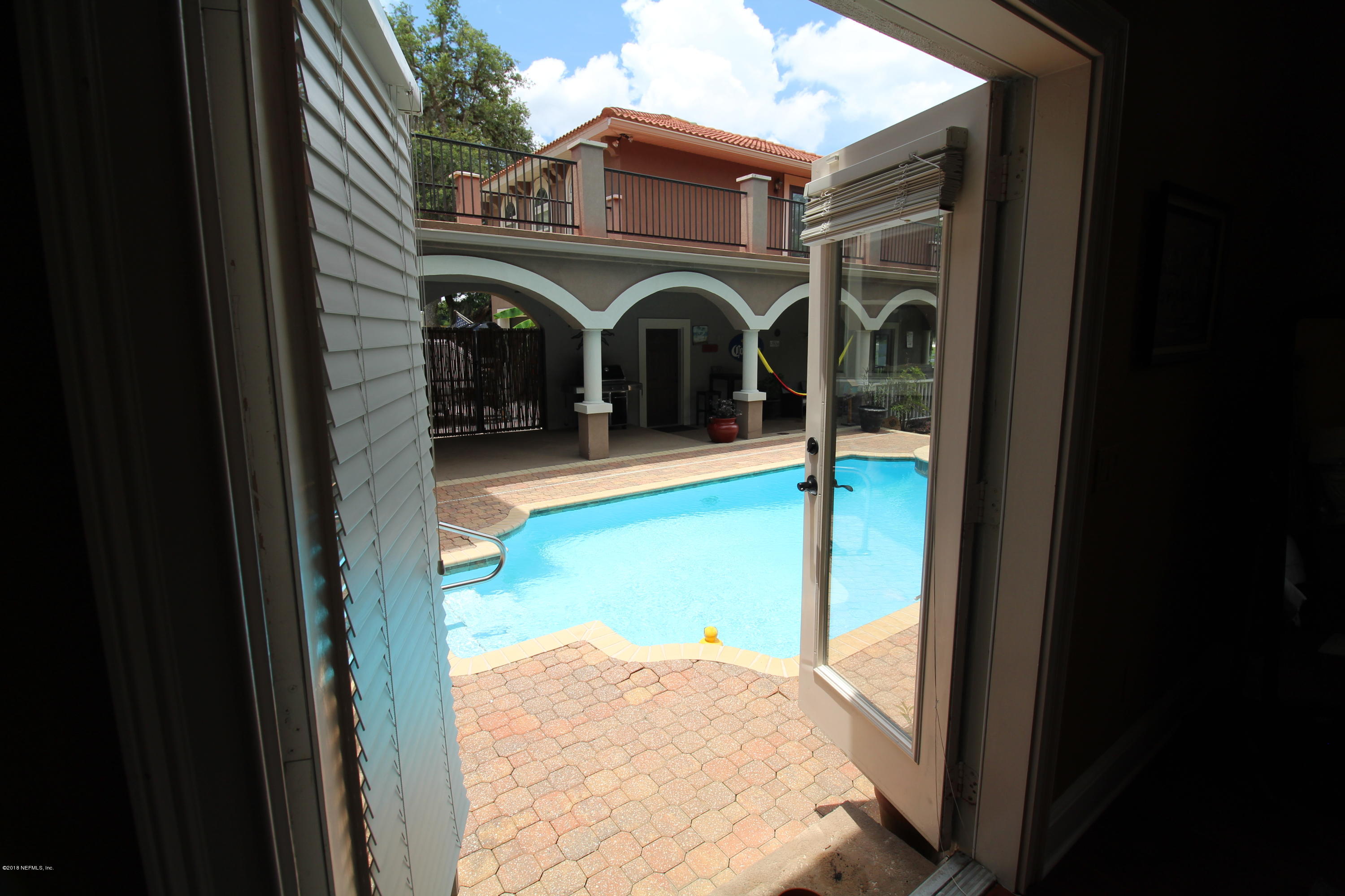 6471 Immokalee Road Keystone Heights, FL 32656 - Photo 51 of 103 a view of a house with a small yard