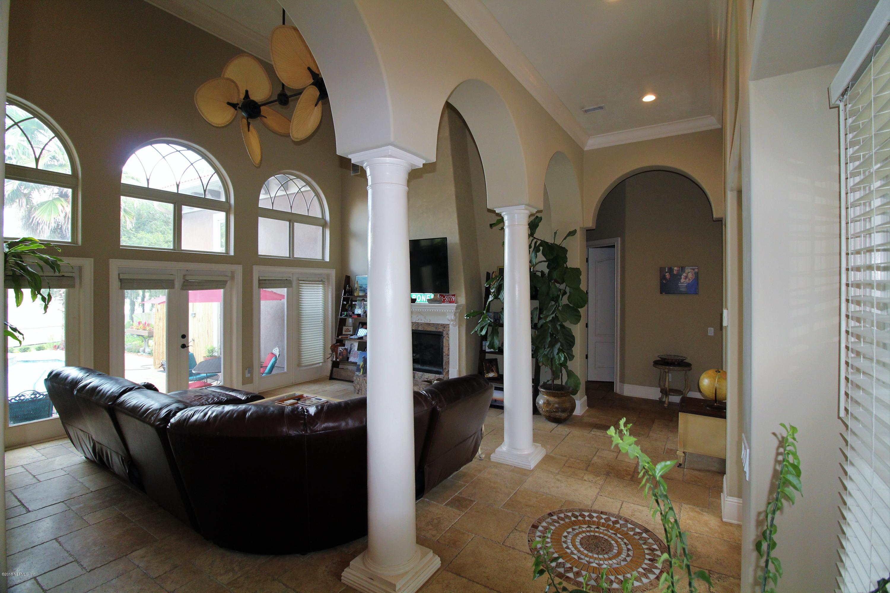 6471 Immokalee Road Keystone Heights, FL 32656 - Photo 7 of 103 a living room with furniture and a window