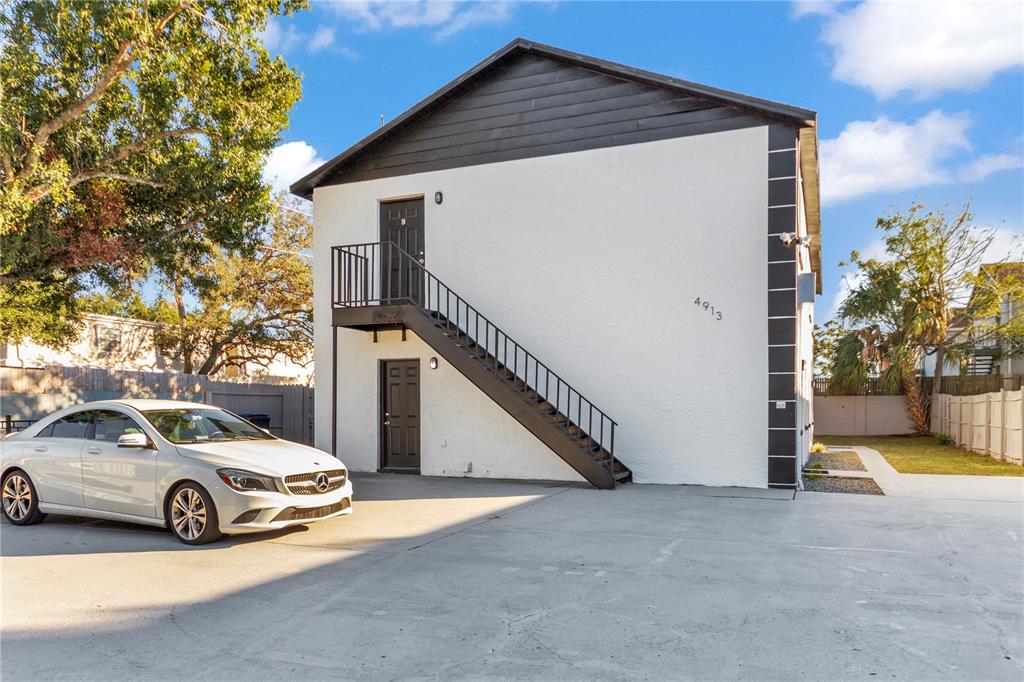 a view of a car in front of house