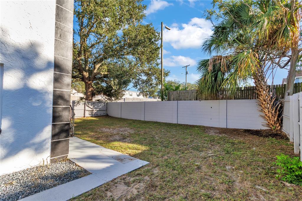 4913 East Temple Heights Road, Unit A Tampa, FL 33617 - Photo 41 of 41 a view of a backyard