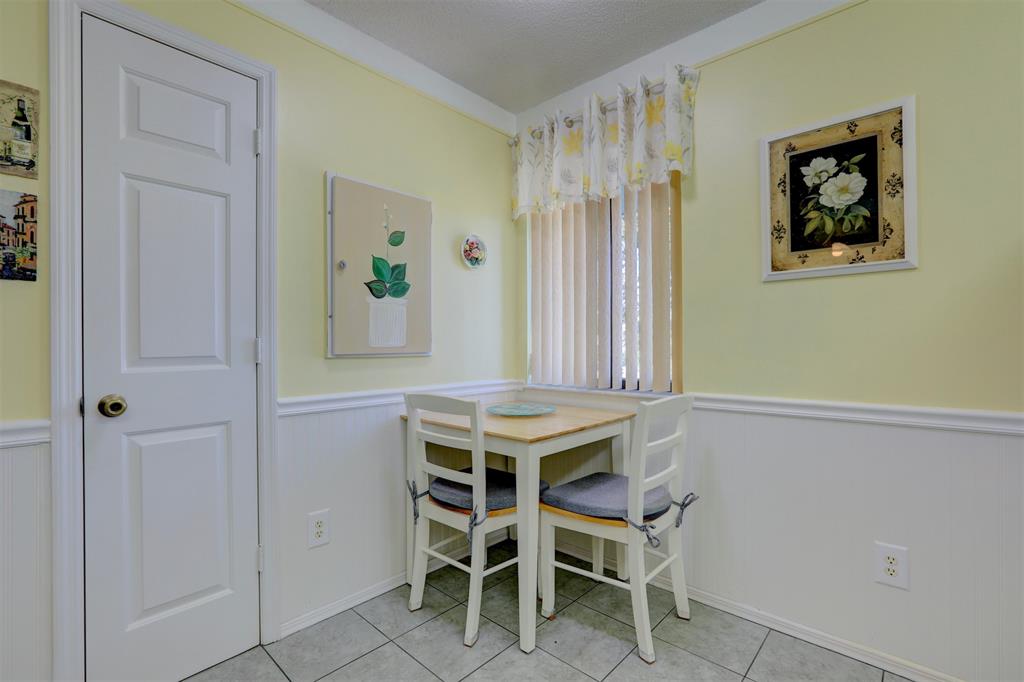9635 Riverside Drive Sebastian, FL 32958 - Photo 15 of 58 a dining room that has a table and chairs in it