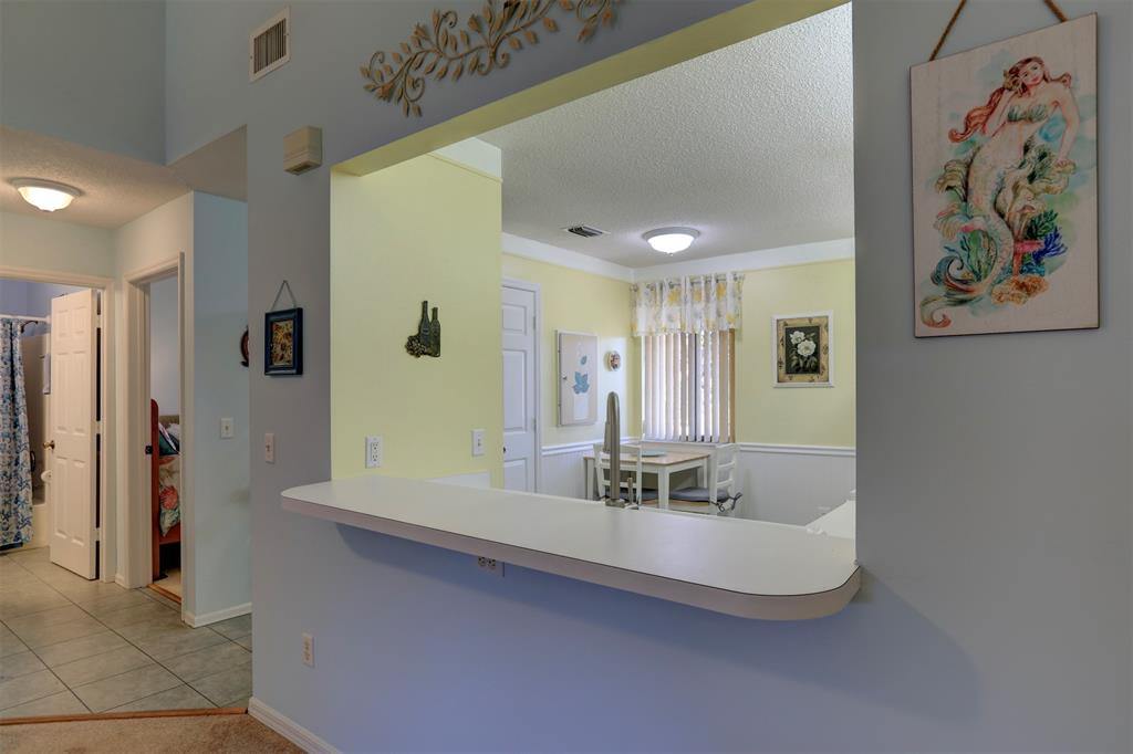 9635 Riverside Drive Sebastian, FL 32958 - Photo 19 of 58 a bathroom with a double vanity sink