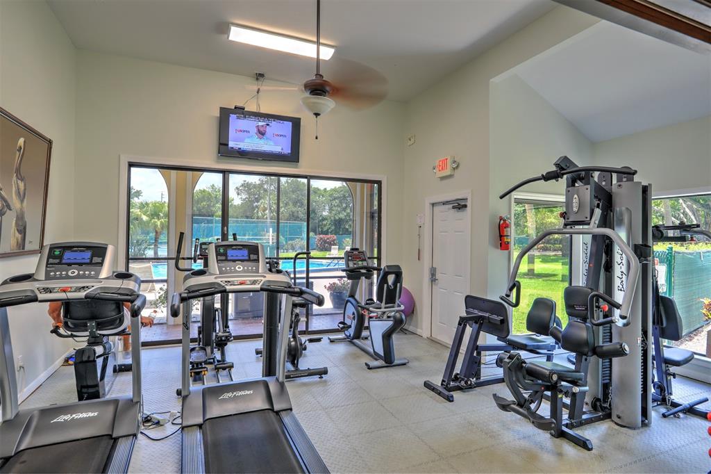 9635 Riverside Drive Sebastian, FL 32958 - Photo 38 of 58 a view of a room with gym equipment