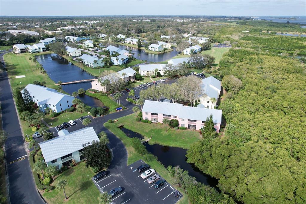 9635 Riverside Drive Sebastian, FL 32958 - Photo 45 of 58 an aerial view of residential houses with outdoor space