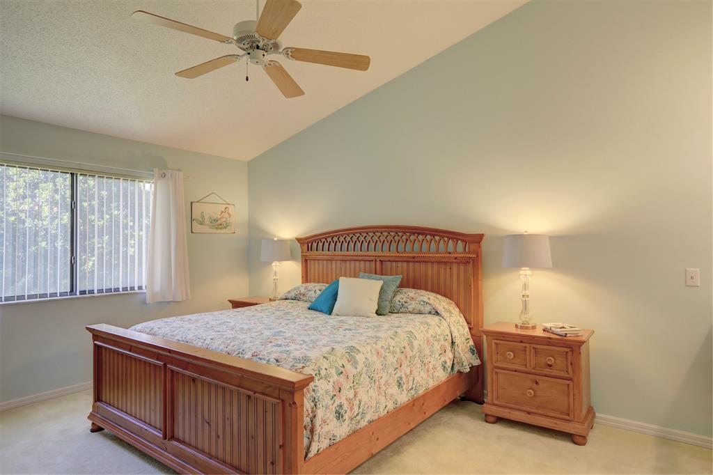 9635 Riverside Drive Sebastian, FL 32958 - Photo 9 of 58 a bedroom with a bed and window