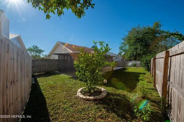 a house view with a garden space