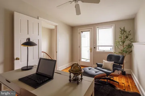 a view of a terrace with chairs