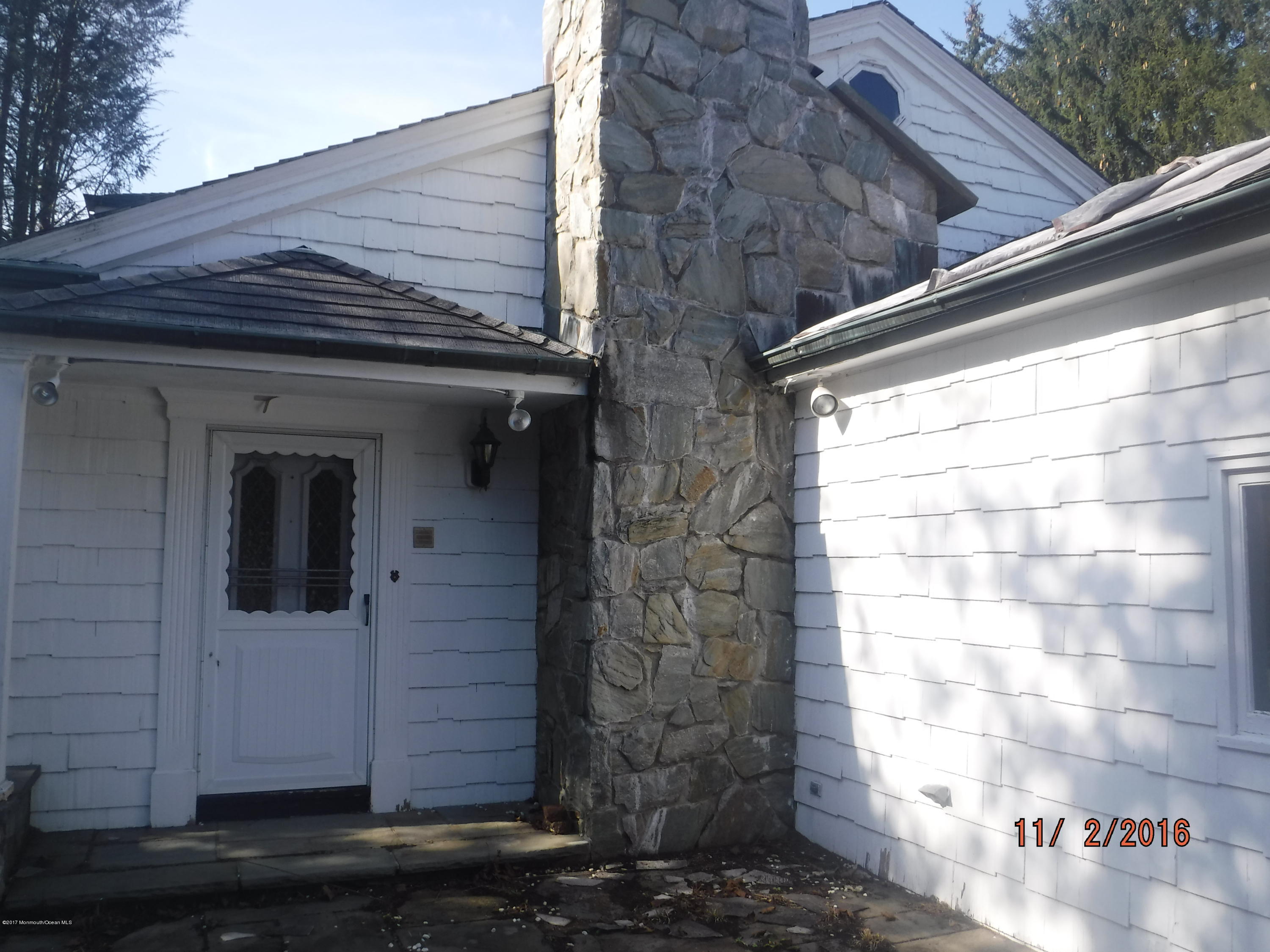 355 East Freehold Road Freehold, NJ 07728 - Photo 35 of 39 side door