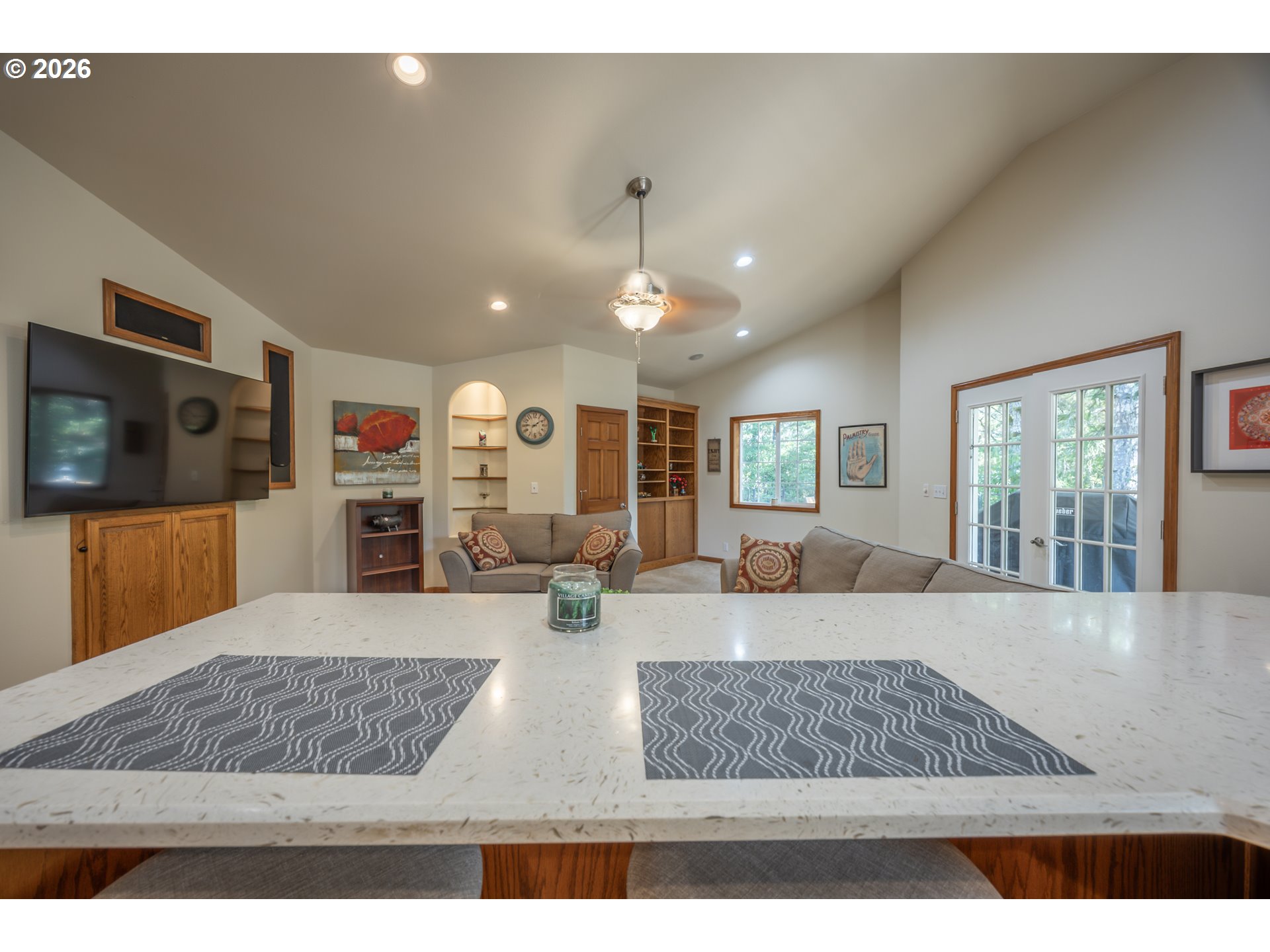 2193 13th Street Florence, OR 97439 - Photo 20 of 48 a living room with furniture and a flat screen tv