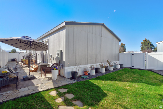 502 West 725 North Logan, UT 84321 - Photo 18 of 25 View of outbuilding featuring a gate and a fenced backyard