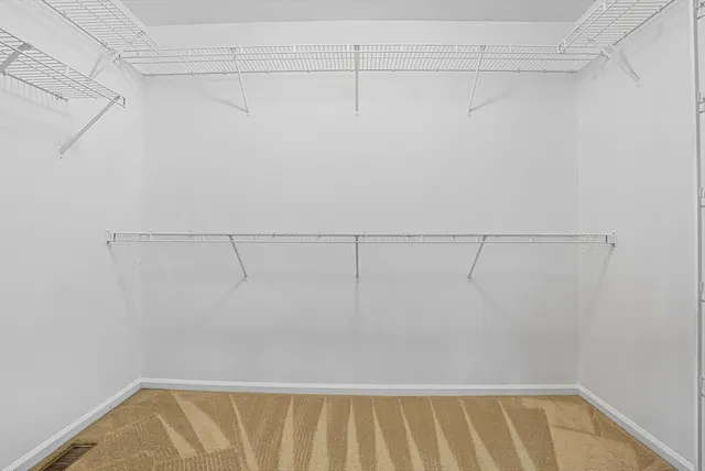 a view of a room with racks on the wall