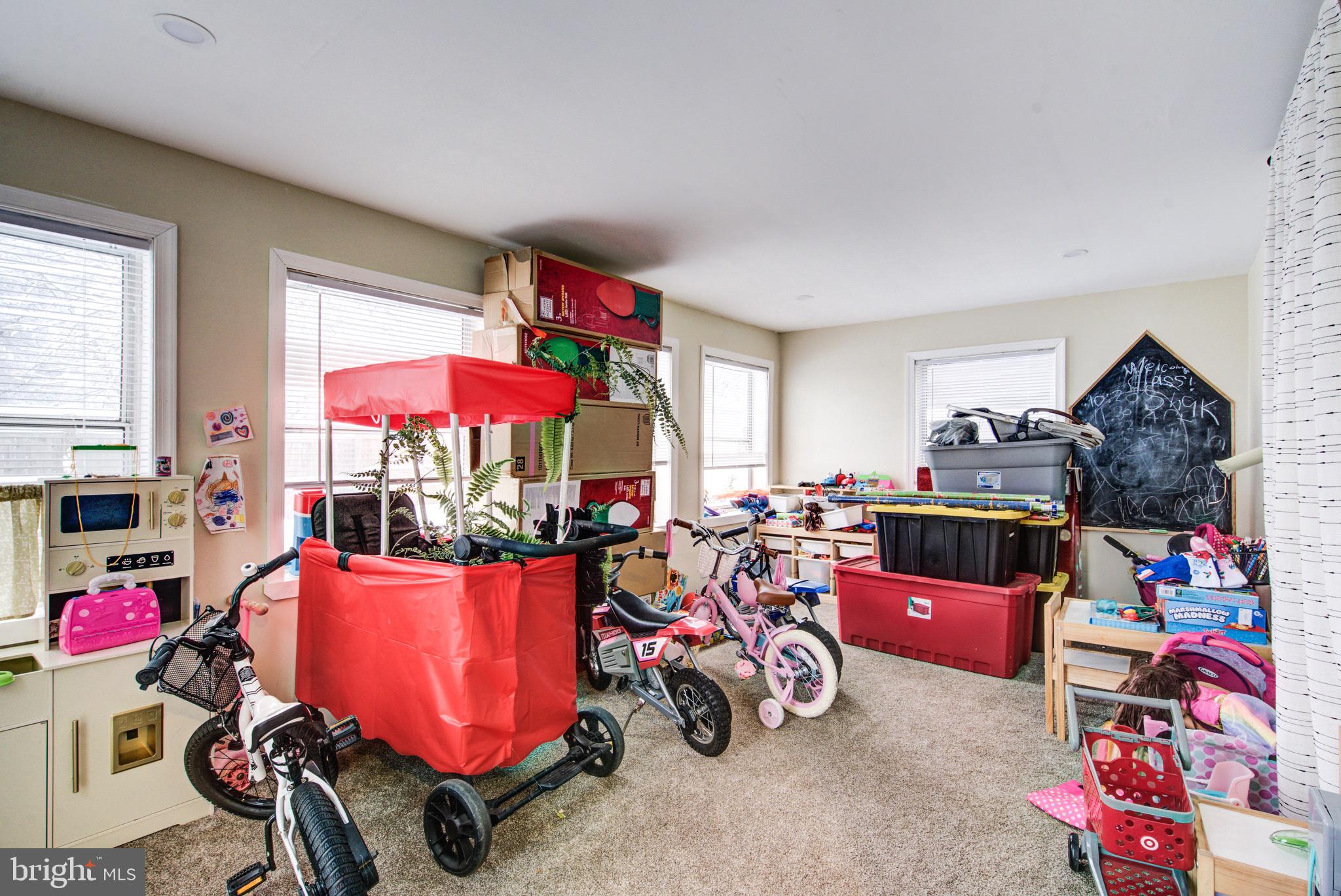 83 Indigo Road Levittown, PA 19057 - Photo 30 of 37 a garage with furniture and a couch
