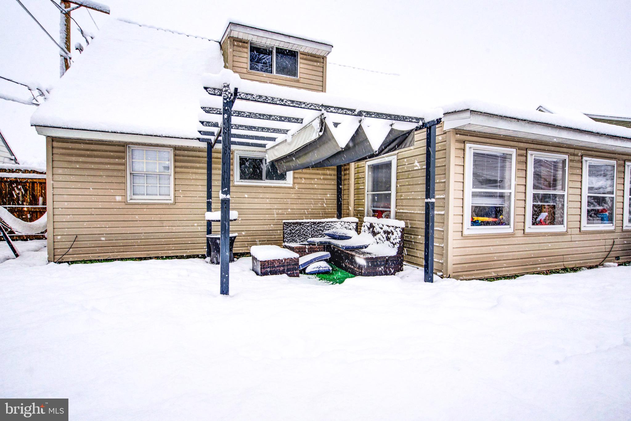 83 Indigo Road Levittown, PA 19057 - Photo 32 of 37 a view of a house with a patio