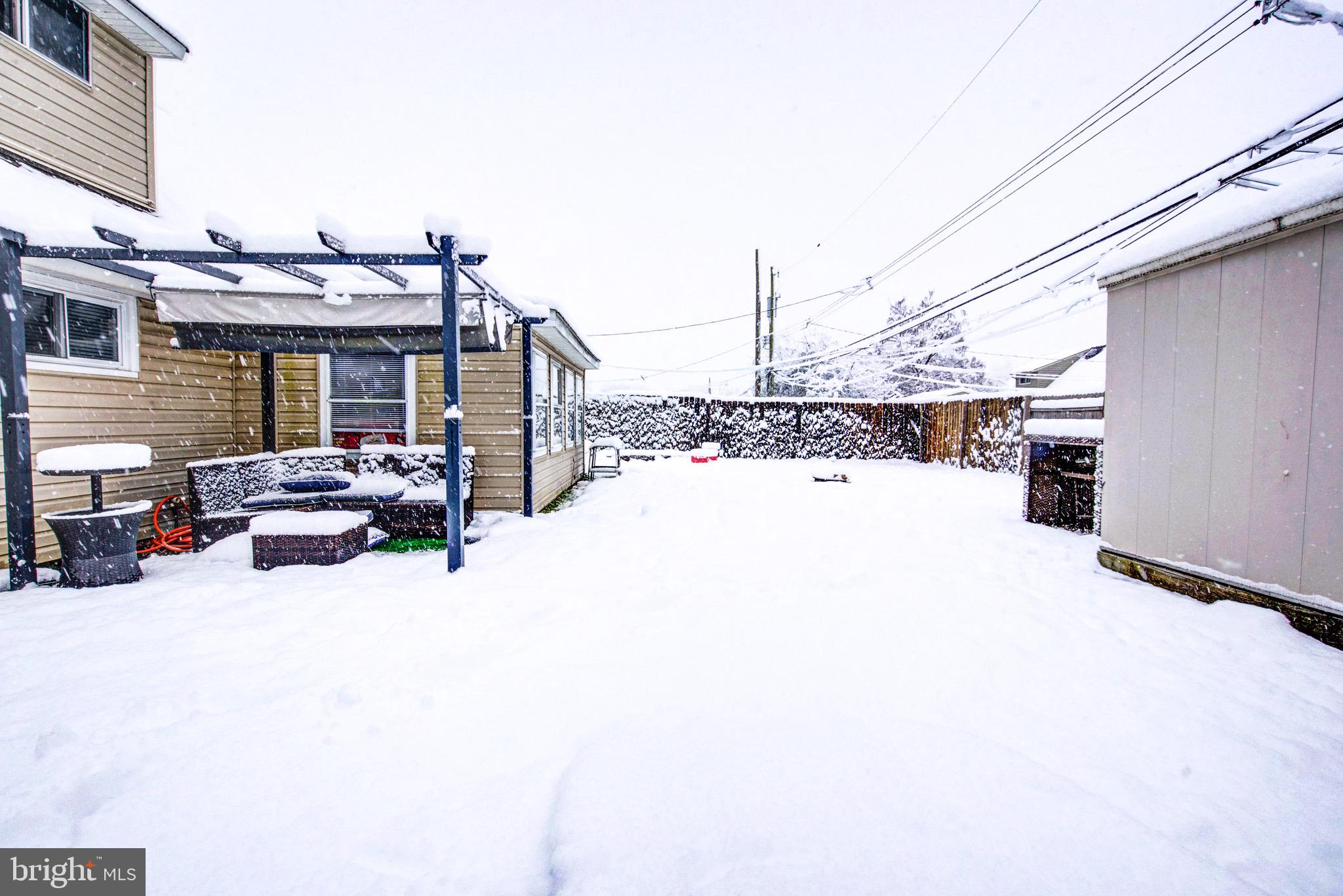 83 Indigo Road Levittown, PA 19057 - Photo 33 of 37 a view of a terrace with a barbeque