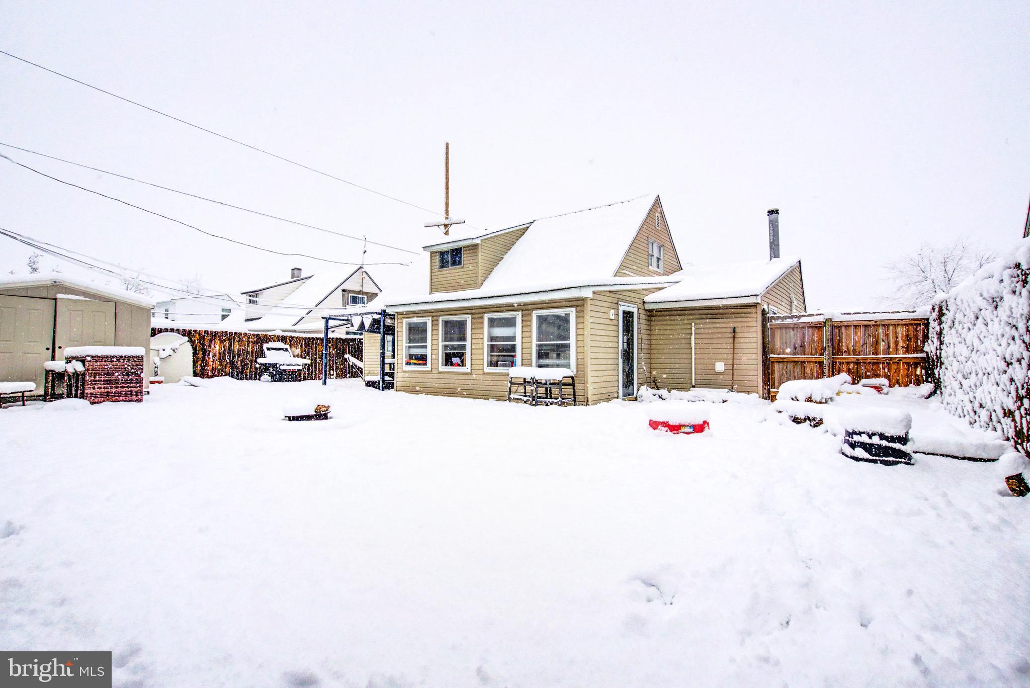 83 Indigo Road Levittown, PA 19057 - Photo 4 of 37 a front view of a house with a yard