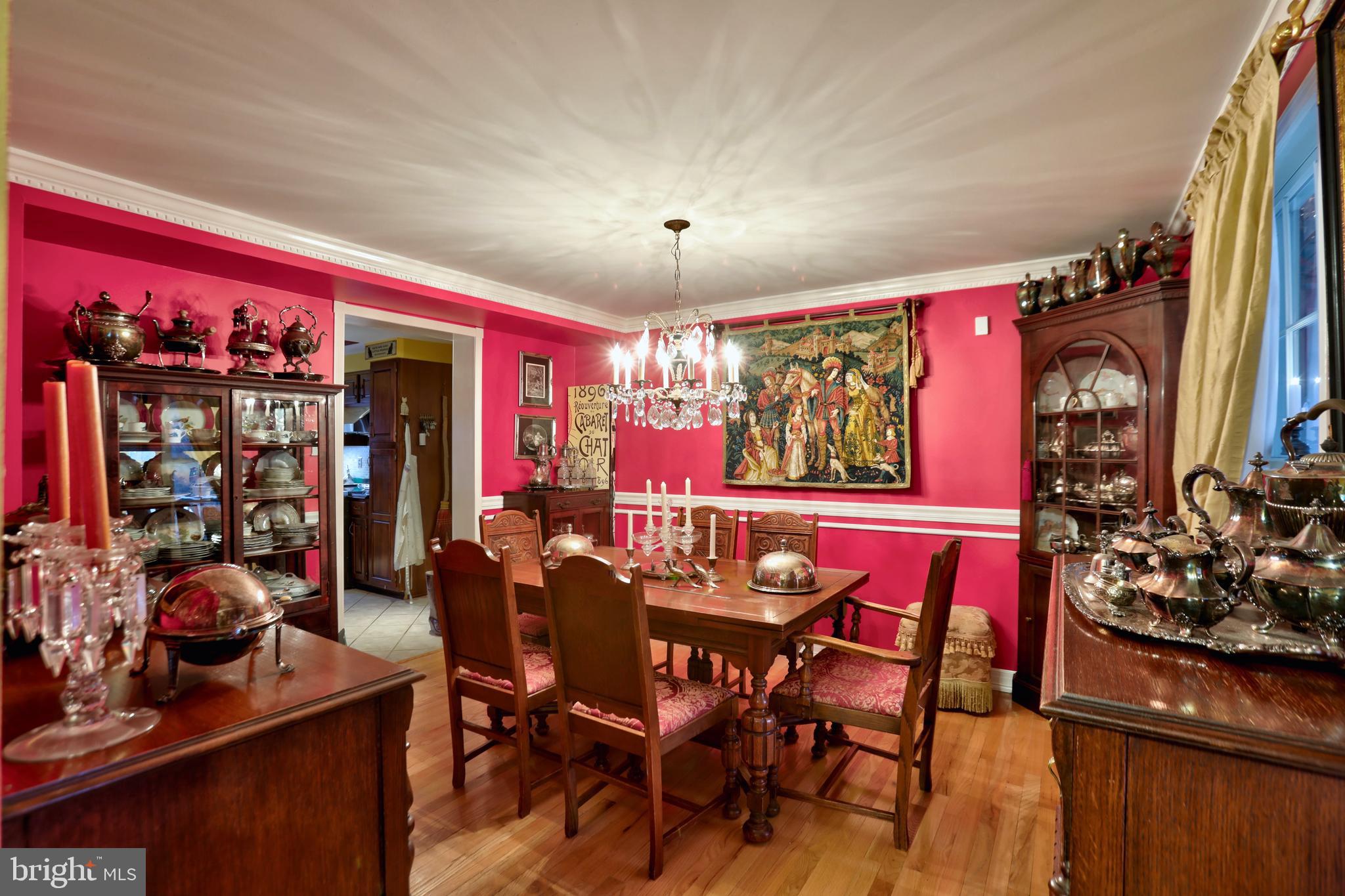 12080 Axline Road Lovettsville, VA 20180 - Photo 14 of 54 a view of a dining room with furniture and chandelier