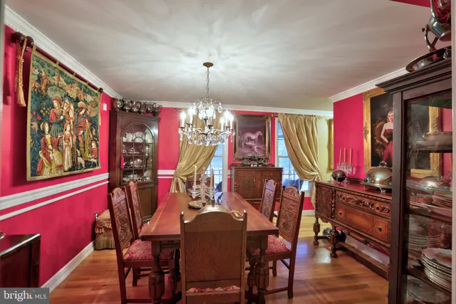 a living room with lots of furniture and a fireplace