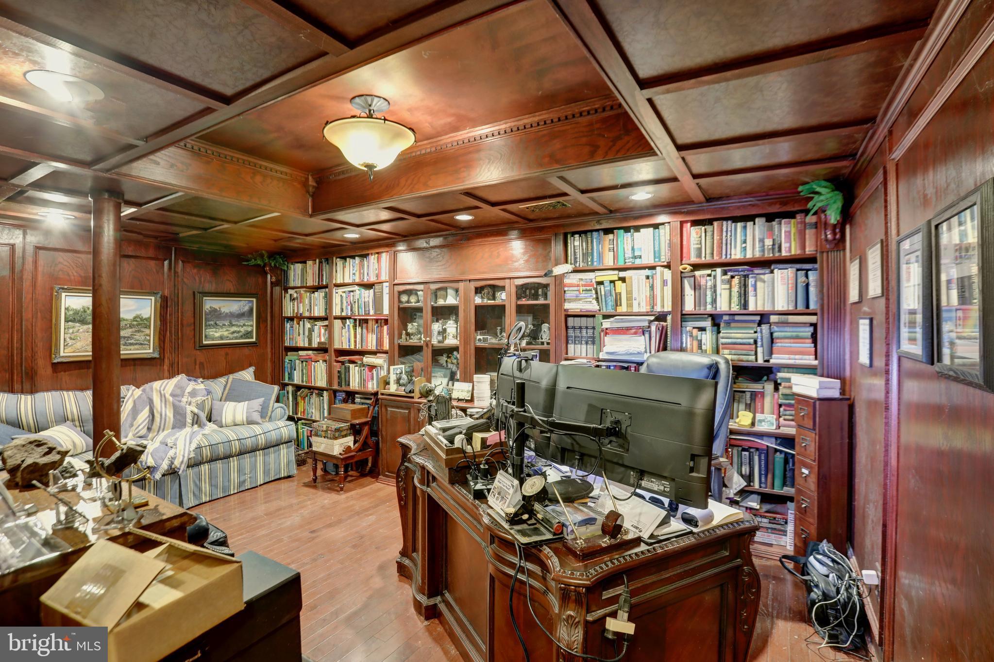 12080 Axline Road Lovettsville, VA 20180 - Photo 16 of 54 a living room with lots of furniture and a fireplace