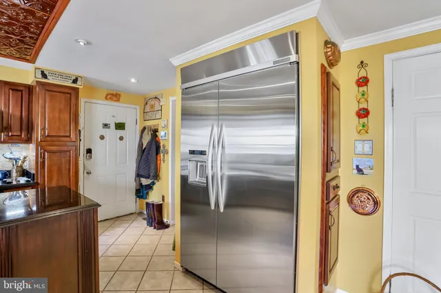 a bathroom with a shower and a glass door