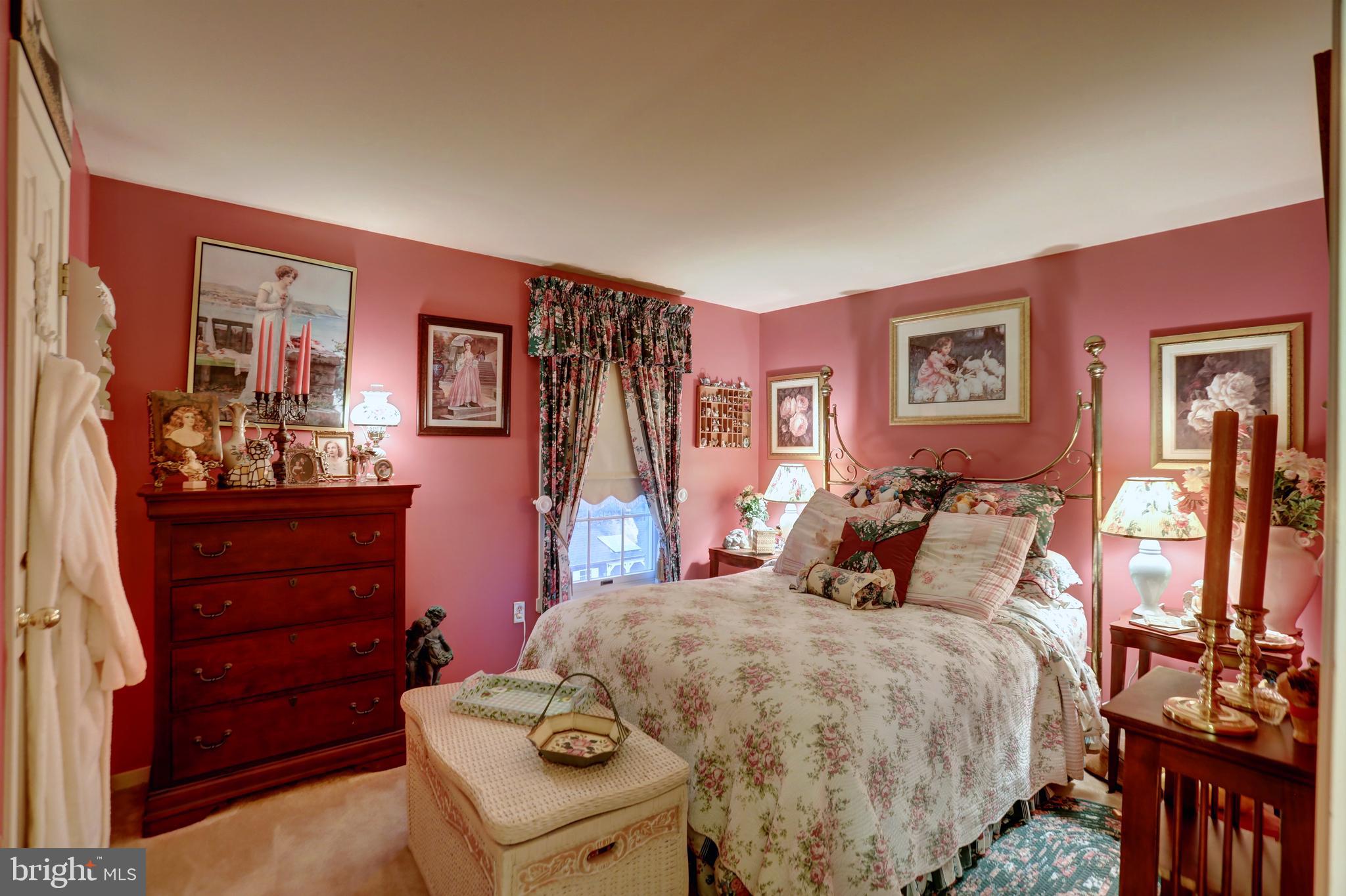 12080 Axline Road Lovettsville, VA 20180 - Photo 23 of 54 a bedroom with a bed and a dresser in it