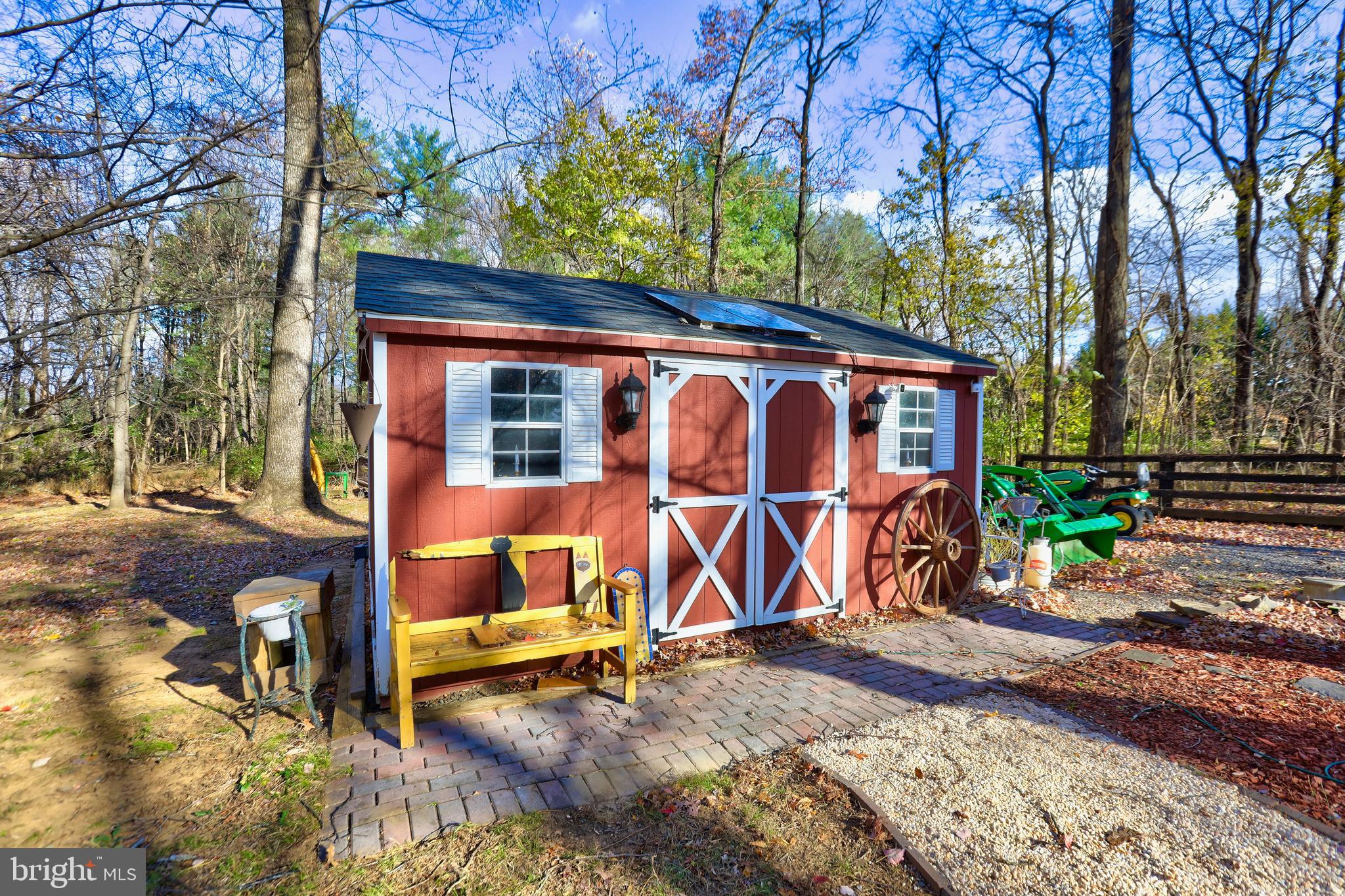 12080 Axline Road Lovettsville, VA 20180 - Photo 29 of 54 a view of backyard with a table and chairs