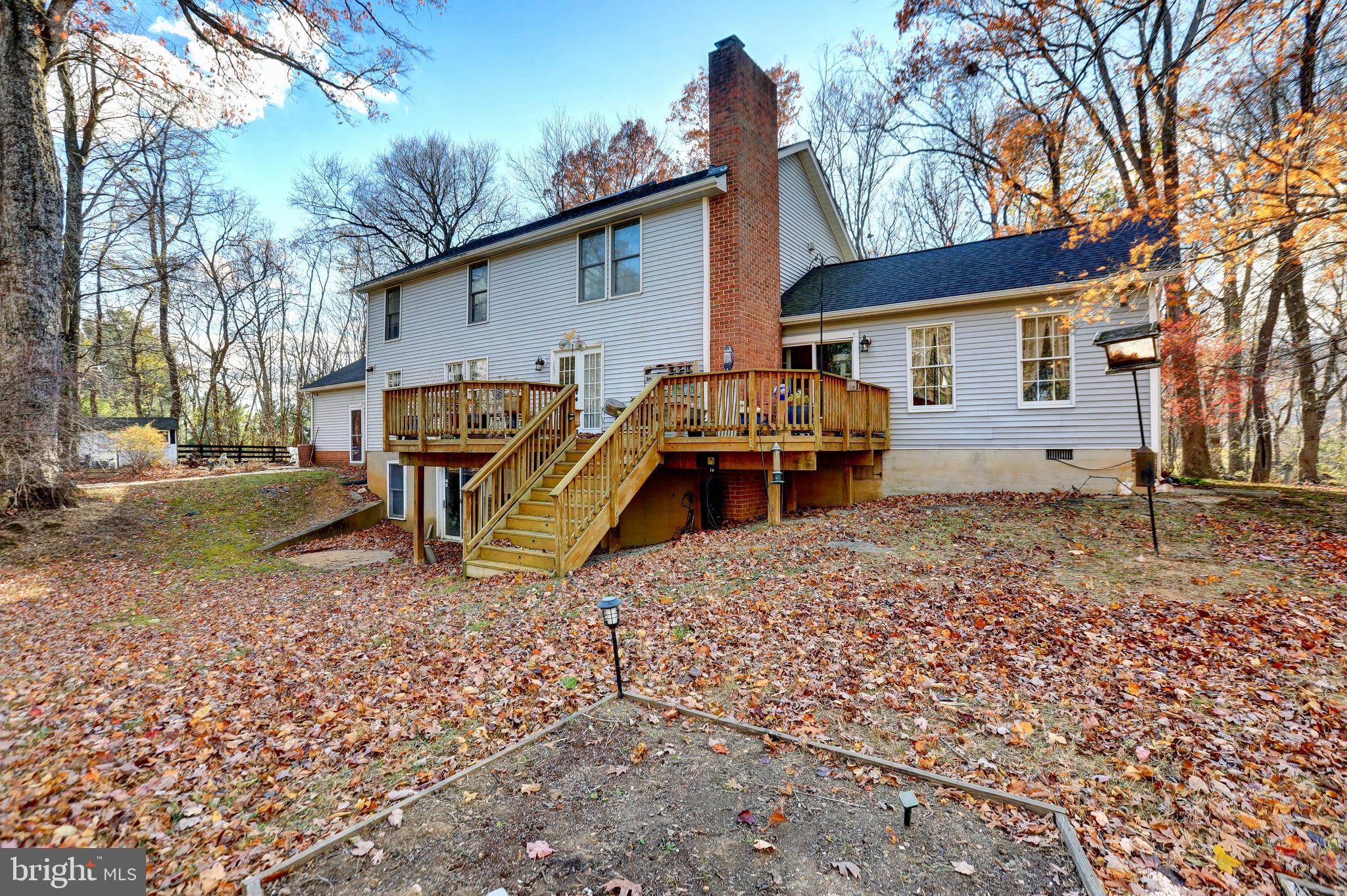 12080 Axline Road Lovettsville, VA 20180 - Photo 42 of 54 a front view of a house with a yard