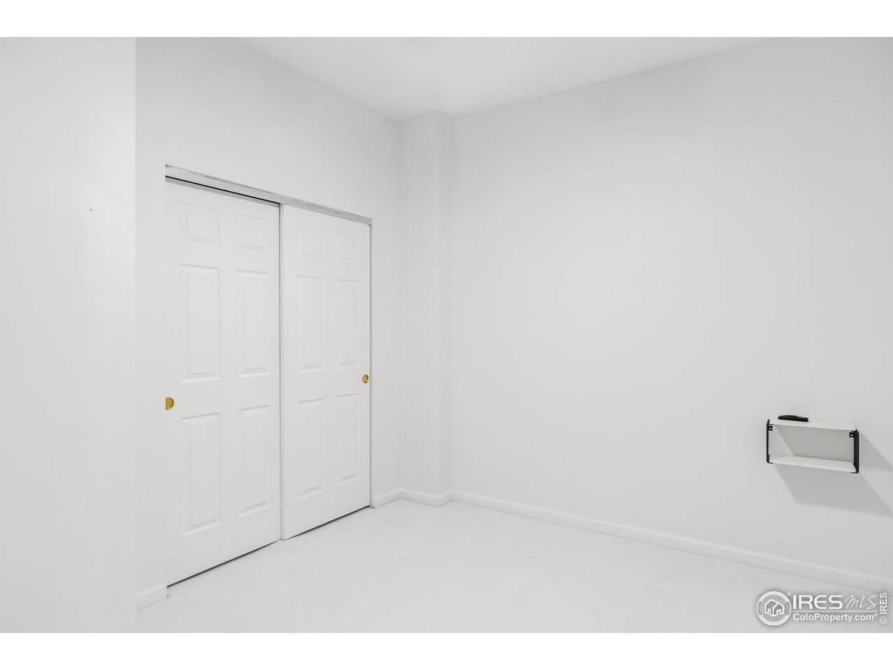 1950 Logan Street, Unit 1013 Denver, CO 80203 - Photo 21 of 23 a view of an empty room